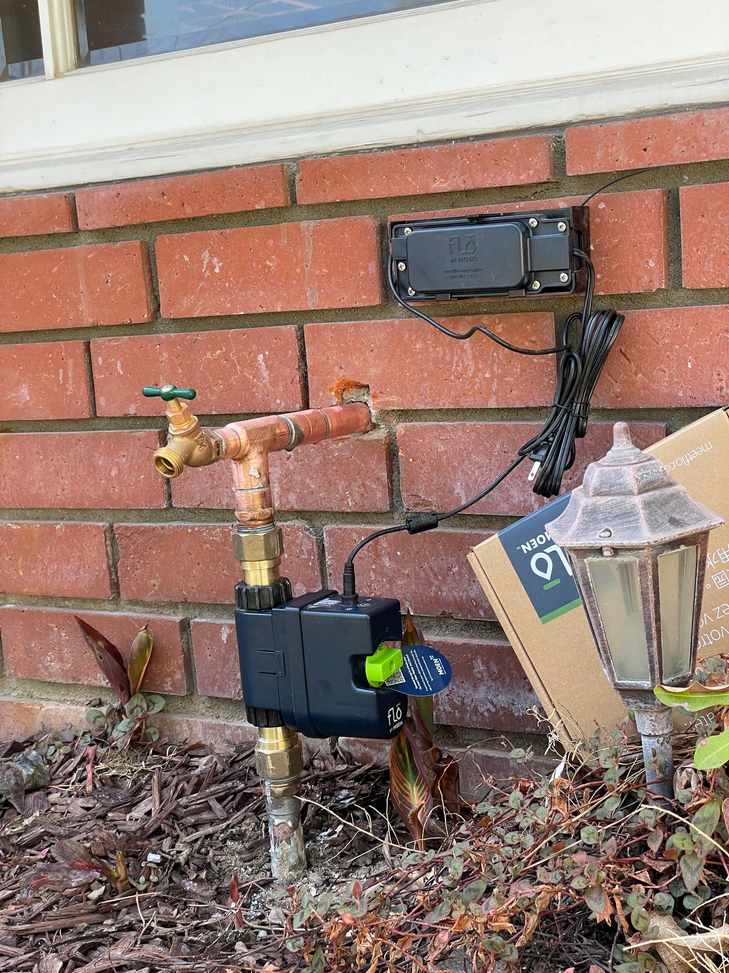 Flo by Moen smart shutoff valve installed on a main water line