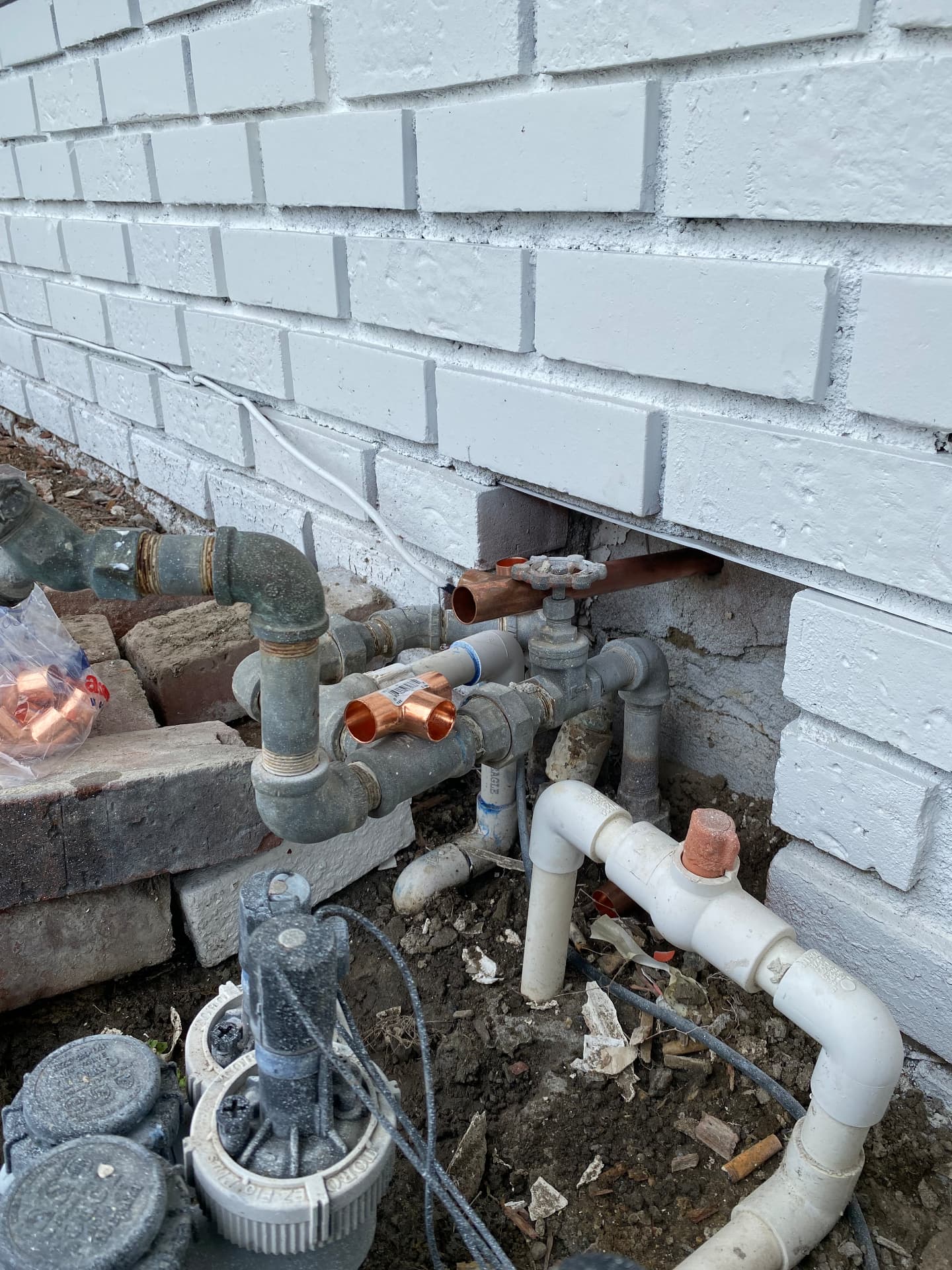 Copper and galvanized water manifold rebuilt at the main shutoff
