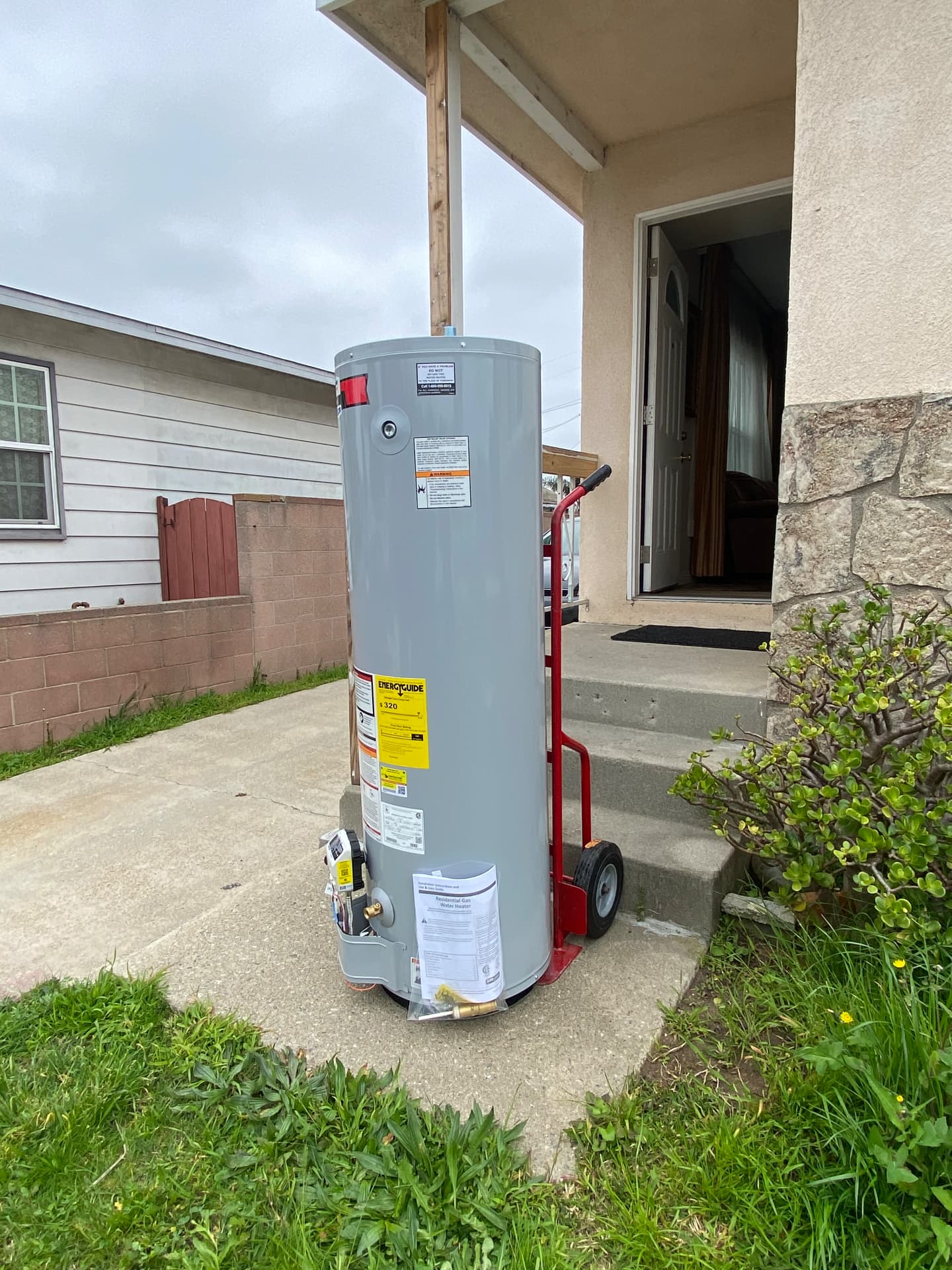 New 40 gallon gas water heater delivered for installation